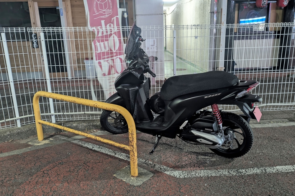 駐車場のDio110